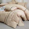 Washed Cotton 4-Piece Bedding Set – Solid Color Embroidered Ribbon, Soft Sheets & Fitted Sheet, 2025 Collection